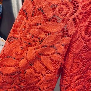 Coral color, brand new, lined, lace dress, never worn.